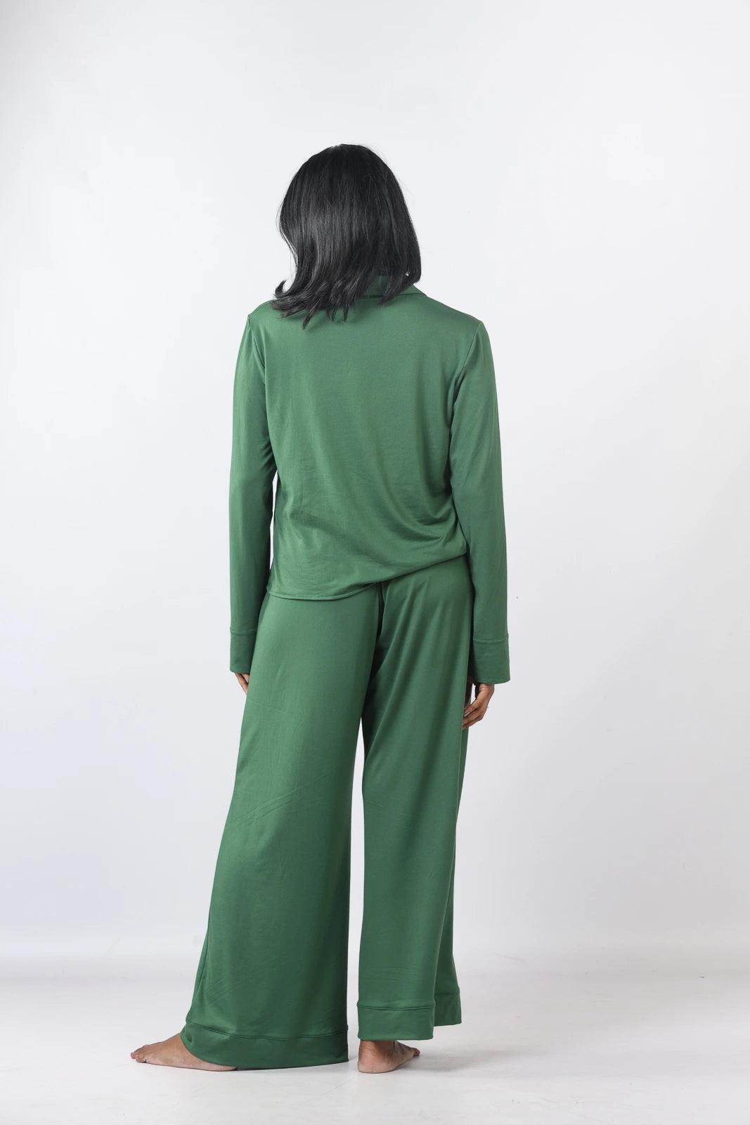 Elegant flared deep green long pants, designed for luxurious comfort. Elevate your loungewear. Shop now!